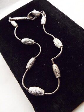 NAPIER SILVERY TURNED & TWISTED BEADS W/ NAPIER NAMEPLATE BRACELET 21